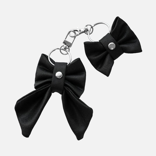 'BOW RIBBON' DENIM BAG CHARM IN WAXED BLACK