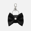 'BOWTIE' DENIM BAG CHARM IN WAXED BLACK