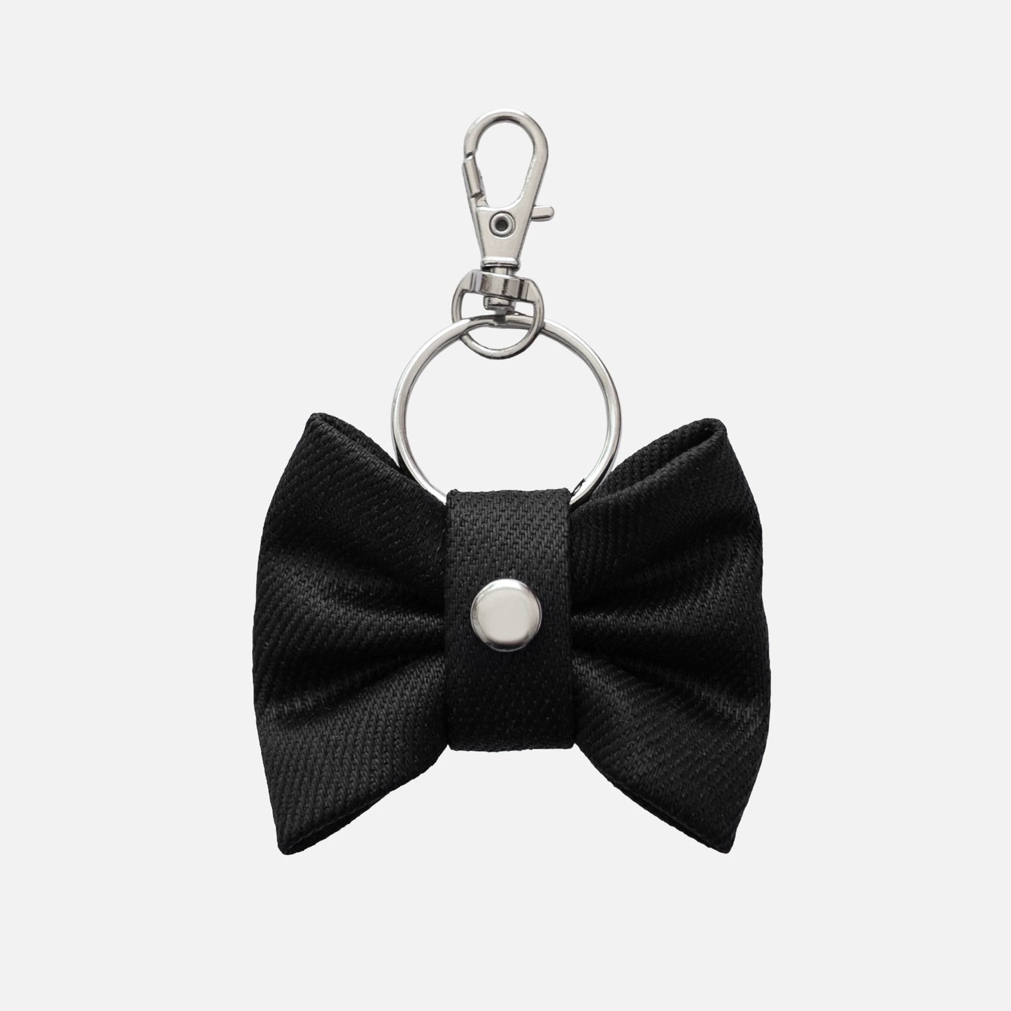 'BOWTIE' DENIM BAG CHARM IN WAXED BLACK