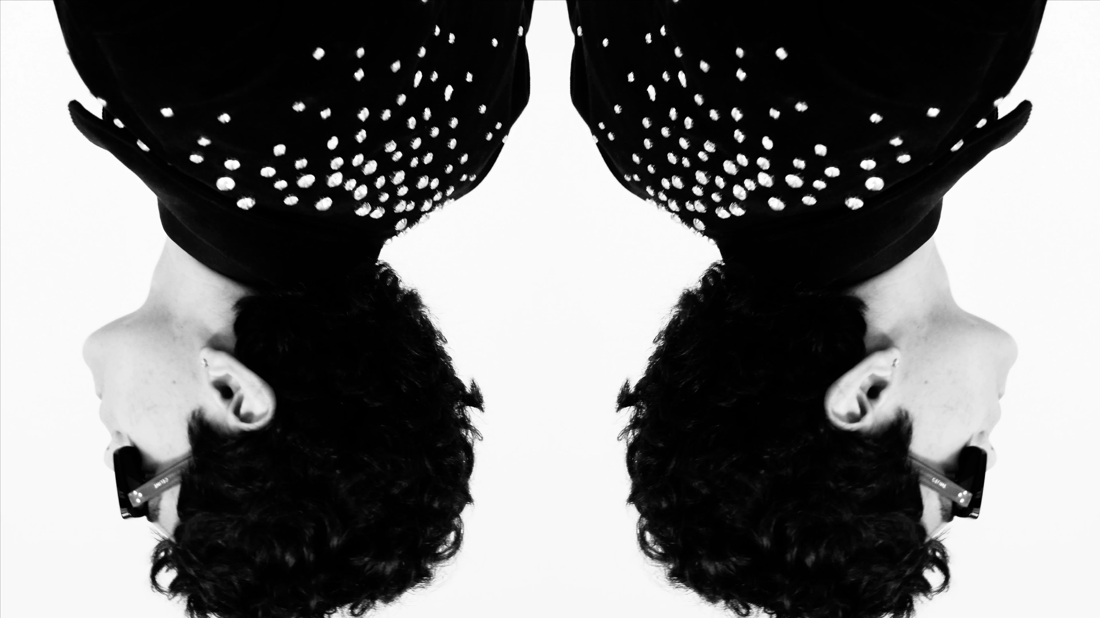 LOAD VIDEO: A short film from SEASON 02 ELIXIR by BRANDON KIM. Starring models Greg and Wendy in the MULHOLLAND DRIVE Crystal Embellished Corduroy Jacket, in a black and white video.