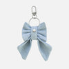'BOW RIBBON' DENIM BAG CHARM IN LIGHT-WASH