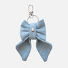 'BOW RIBBON' DENIM BAG CHARM IN LIGHT-WASH