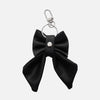 'BOW RIBBON' DENIM BAG CHARM IN WAXED BLACK
