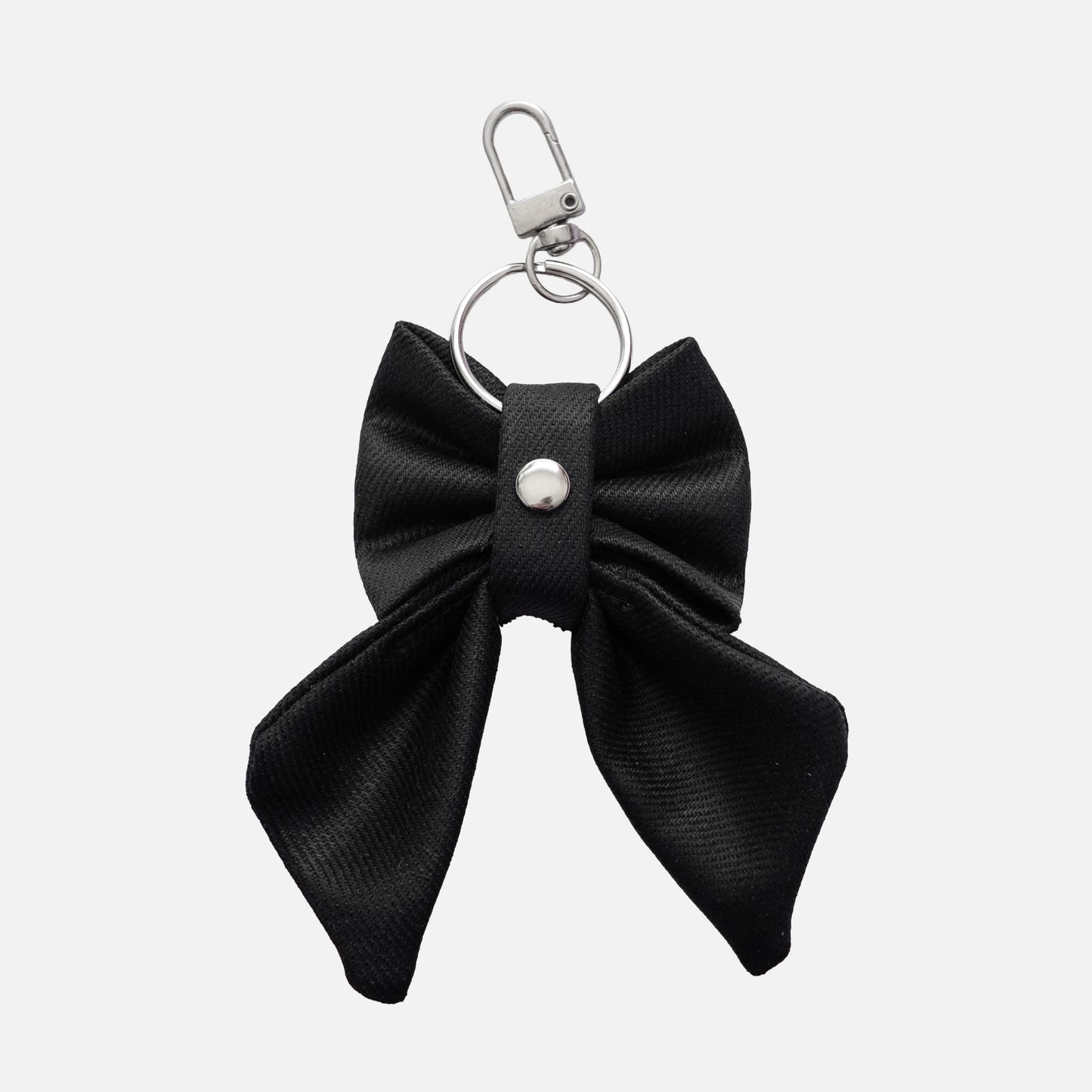 'BOW RIBBON' DENIM BAG CHARM IN WAXED BLACK