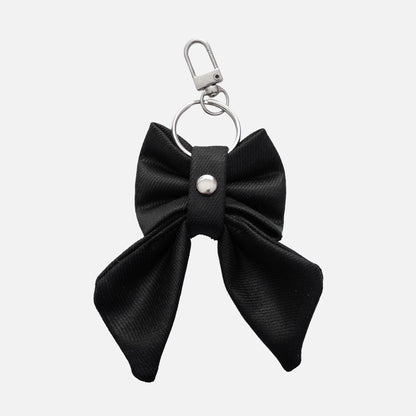 'BOW RIBBON' DENIM BAG CHARM IN WAXED BLACK