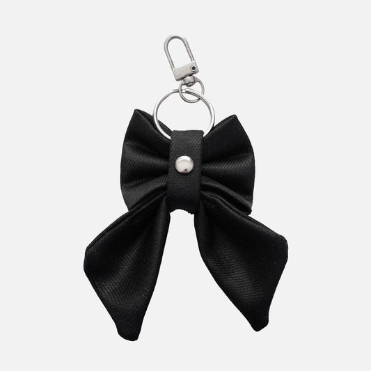 'BOW RIBBON' DENIM BAG CHARM IN WAXED BLACK