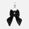 'BOW RIBBON' DENIM BAG CHARM IN WAXED BLACK