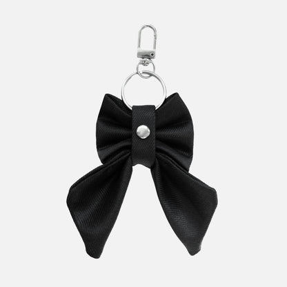 'BOW RIBBON' DENIM BAG CHARM IN WAXED BLACK