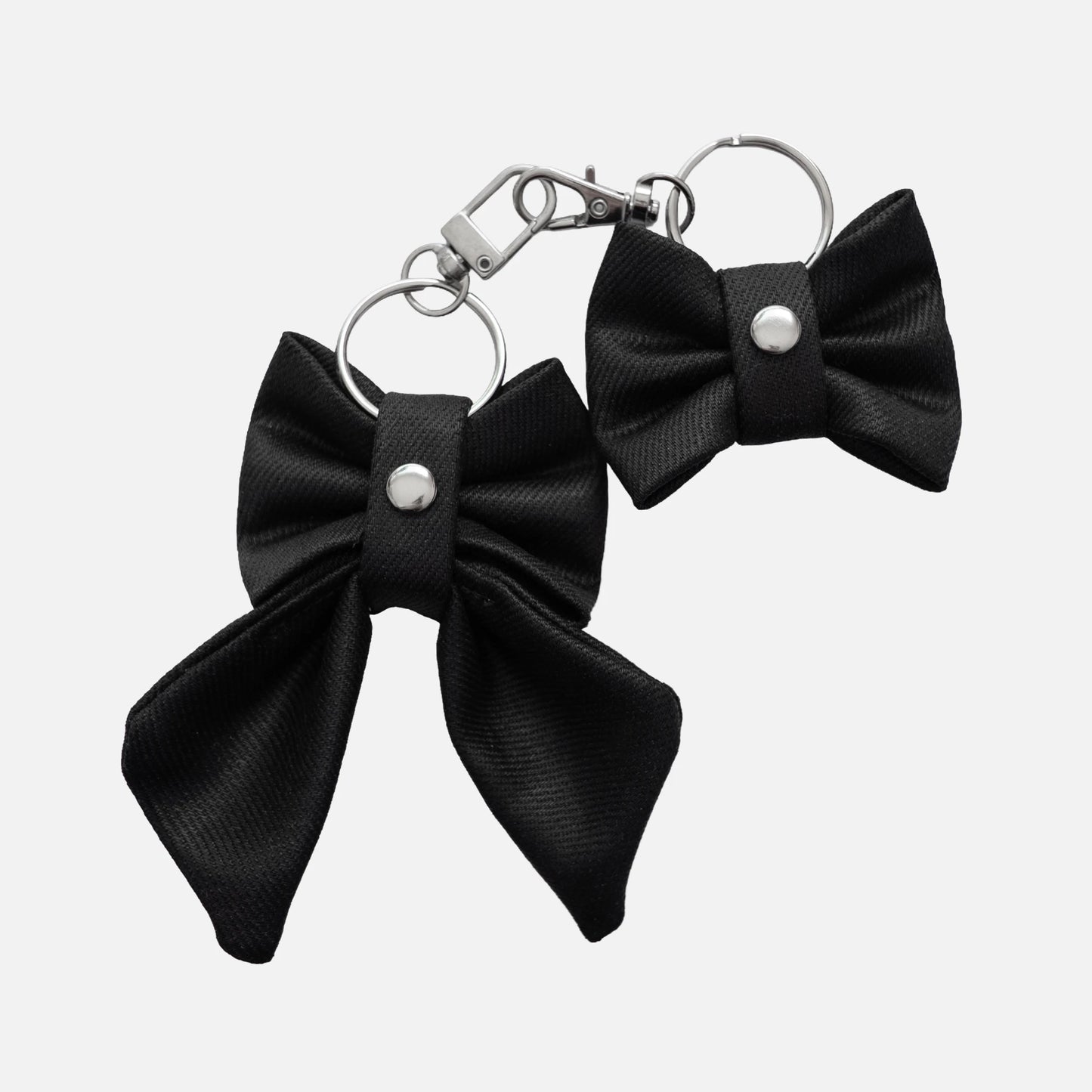 'BOW RIBBON' DENIM BAG CHARM IN WAXED BLACK
