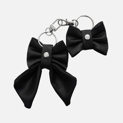 'BOW RIBBON' DENIM BAG CHARM IN WAXED BLACK