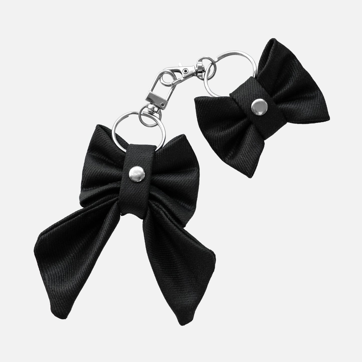 'BOWTIE' DENIM BAG CHARM IN WAXED BLACK