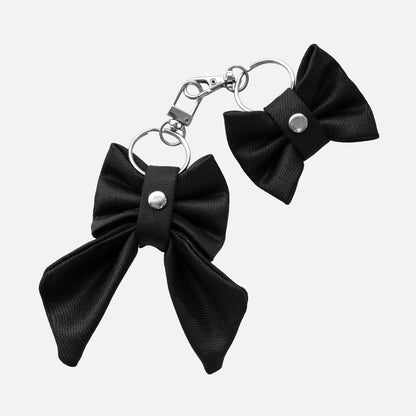 'BOWTIE' DENIM BAG CHARM IN WAXED BLACK