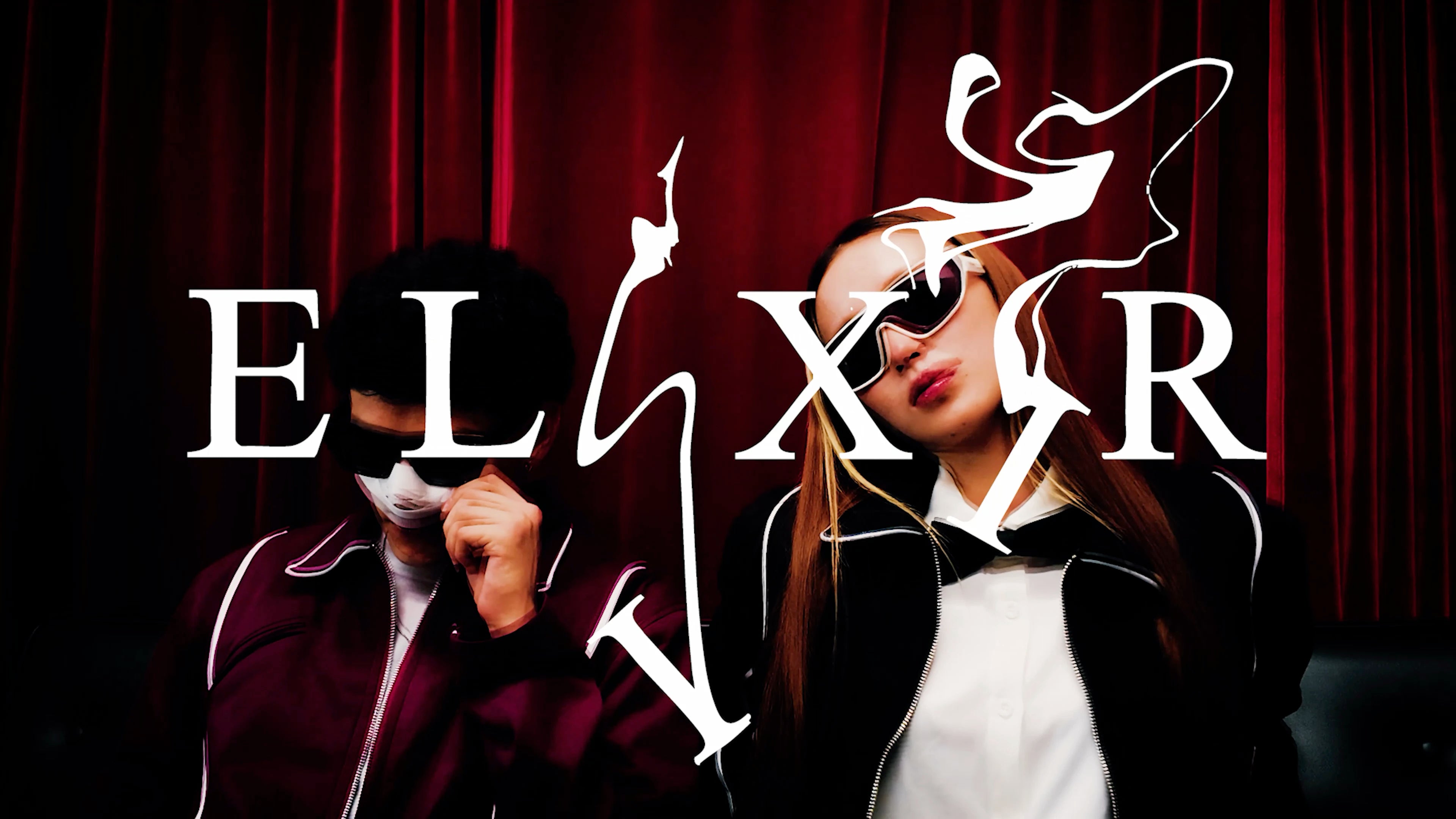 LOAD VIDEO: The official reveal trailer for SEASON 02 ELIXIR by BRANDON KIM. Starring models Greg and Wendy in the COURTNEY Bias Tape Trim Jackets. Set against a red curtain, the trailer explores themes of Hollywood nightlife, the heroin-chic era, and youth identity in the digital world.